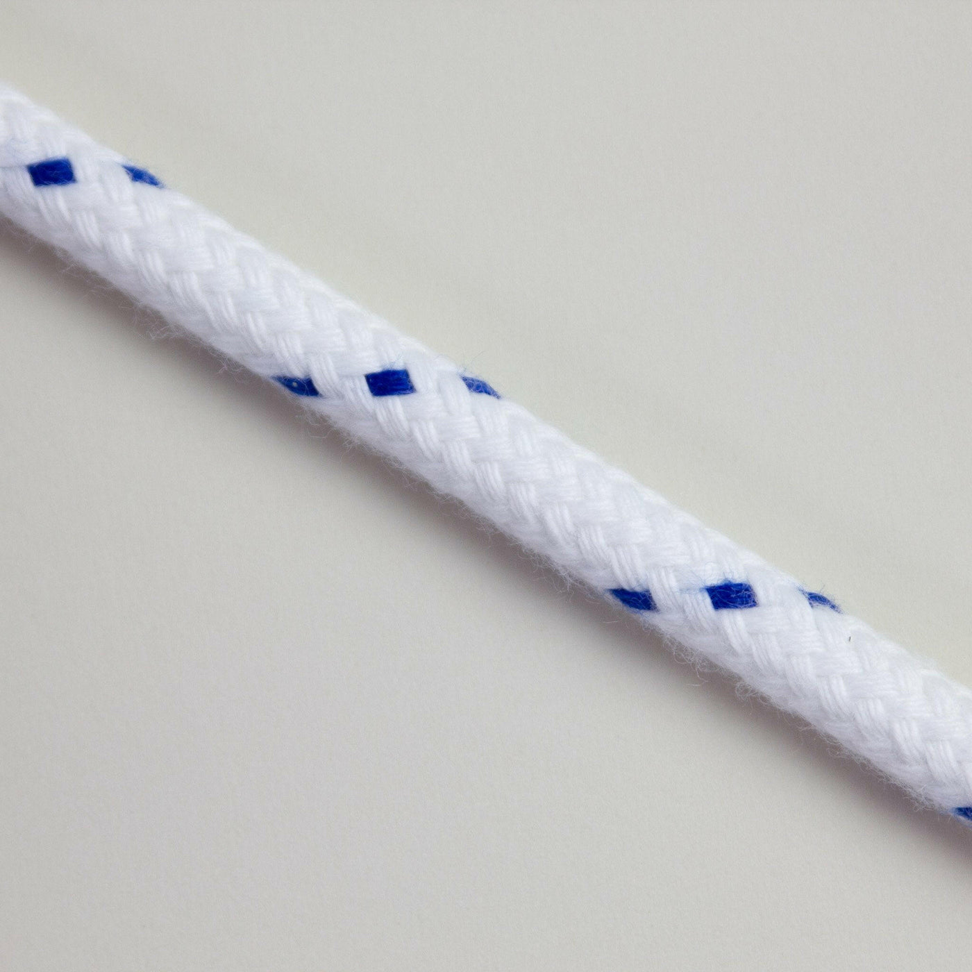 Soft Matt Braided Polyester White with Blue Fleck 6mm.
